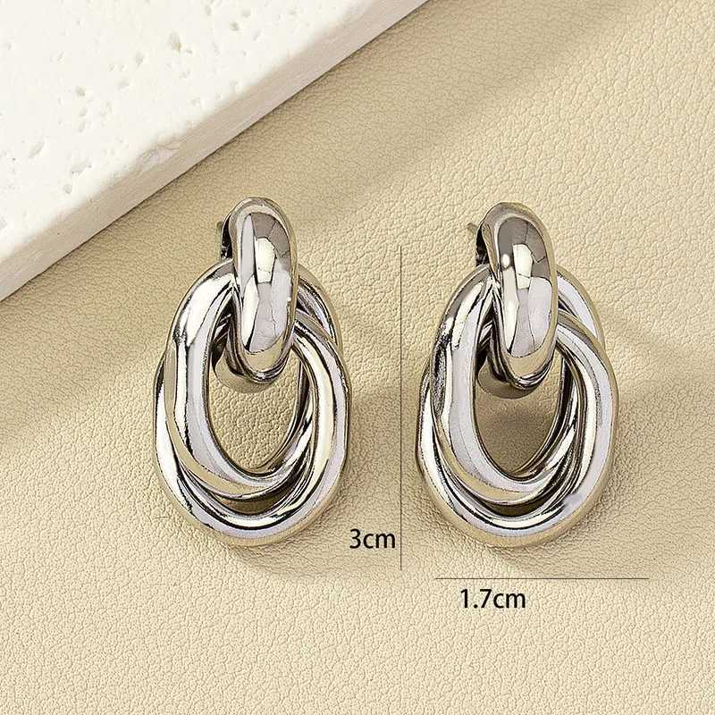 Double layered twisted hollow geometric metal stud earrings suitable for womens hip-hop personality silver jewelry Christmas girl gift Y250401
