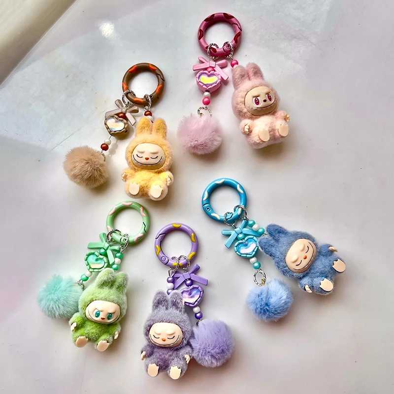 Mini Labubu keychain cartoon creative 3D doll student backpack pendant car keychain womens display 2025 W250402