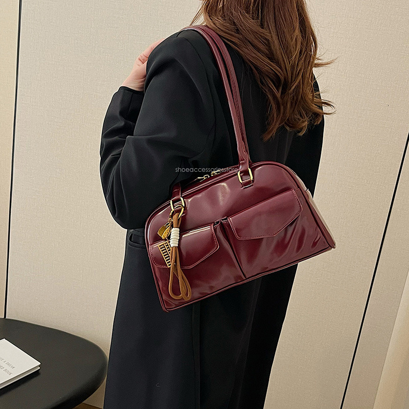 New Free Shipping Designer Bag 2025 New Fashion Pillow Women's Autumn/winter Boston Handheld Shoulder Bag