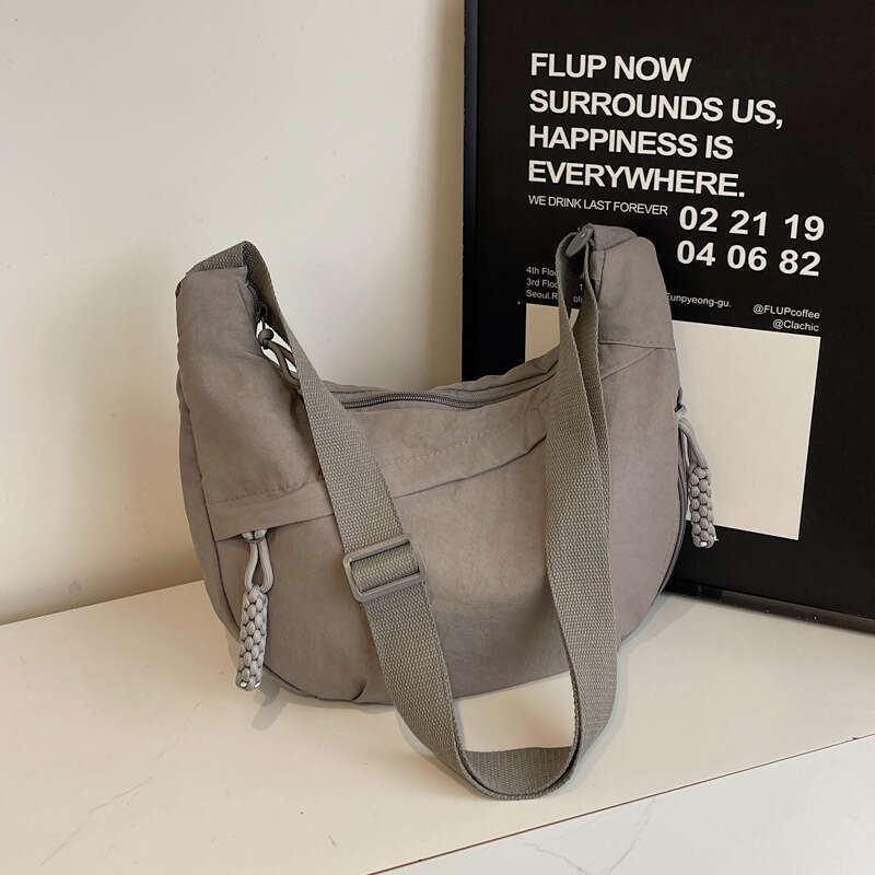 2025 NEW Female student fashion class crossbody nylon cloth large capacity shoulder solid color simple and versatile travel dumpling bag