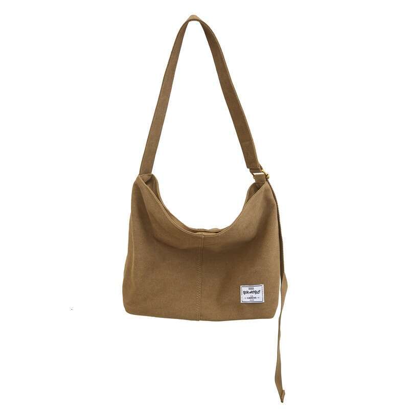 2025 NEW Canvas men's crossbody, Korean version, new student shoulder bag, large capacity, original style, portable backpack, women's versat