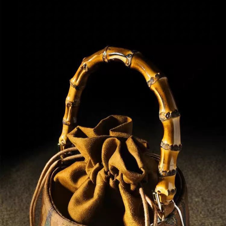 new free shipping designer bags Spring and summer new style bamboo bucket bag retro tassel handbag, single shoulder cross body women's bag