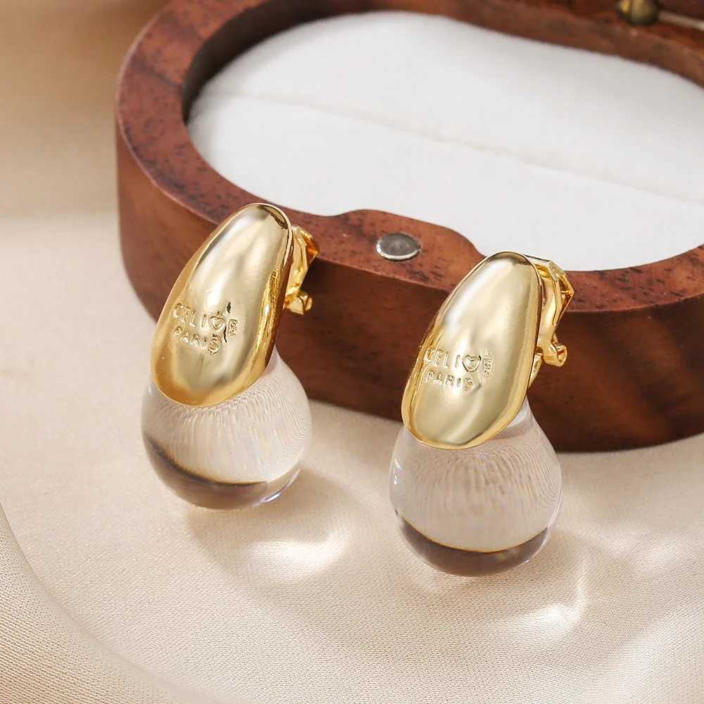 Newly arrived vintage resin tears clipped onto womens earrings metal splicing fashionable luxury earrings charming jewelry gifts banquet Y250401