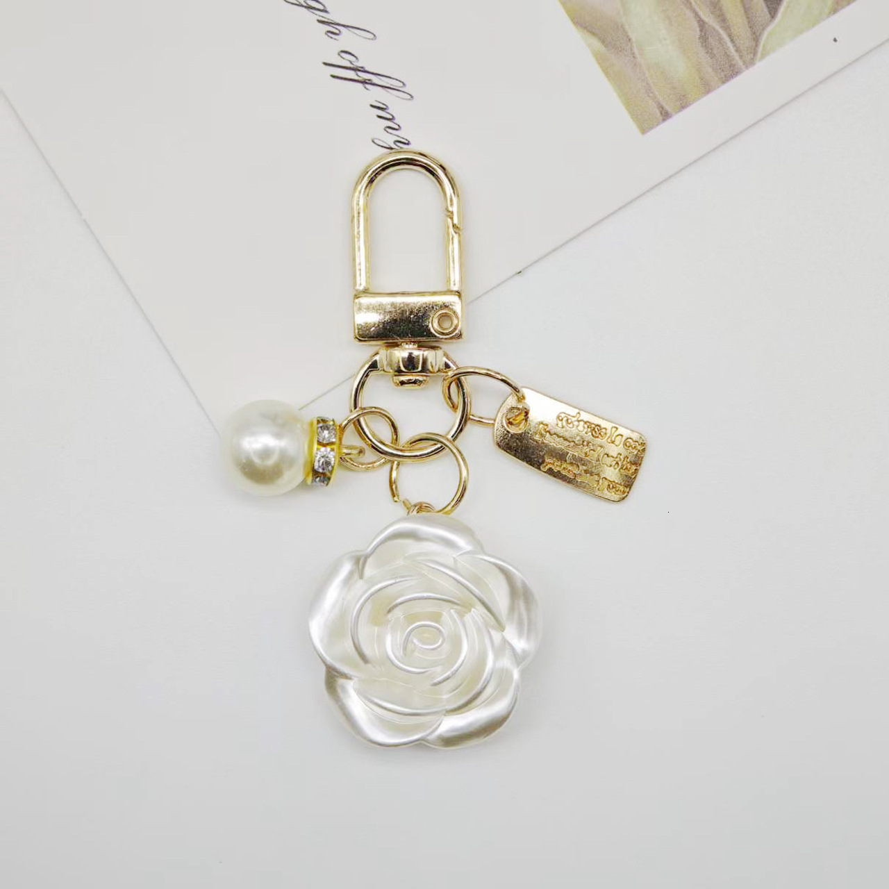 designer bag charm New Pearl Alloy Keychain Creative Hollow Heart Nameplate Accessories Earphone Case Bag Decoration Pendant keychain designer