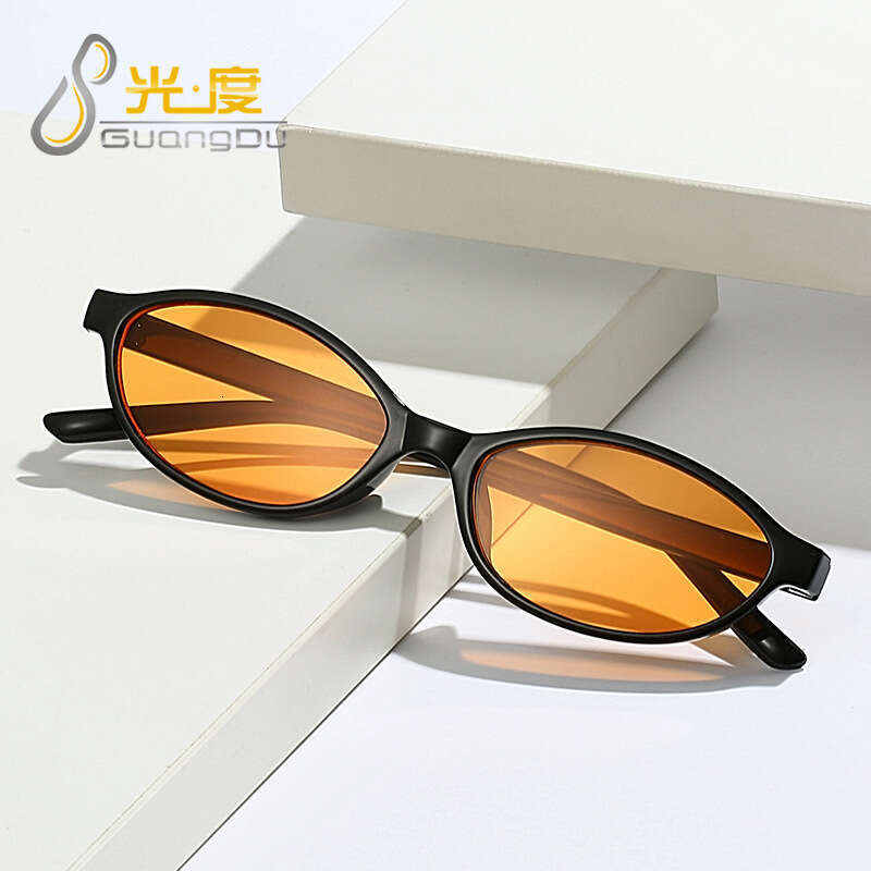 Fashionable oval frame women, cat eye street photography, personalized and trendy sunglasses, suitable for wearing sunglasses