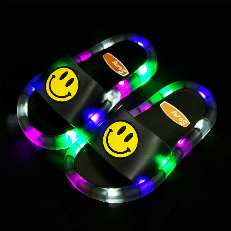 Internet celebrity new glowing childrens slippers cartoon smiling face flashing one line dragging girls anti slip luminous shoes J250403