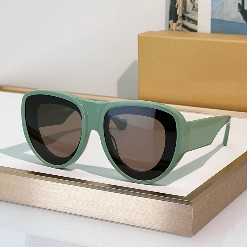 Designer Men Women Luxury Sunglasses LW40172 Front Lens Fashion Elliptical Sunglasses Acetate Green Frame Thick Plate Personalized Trendy Avant garde Style UV400