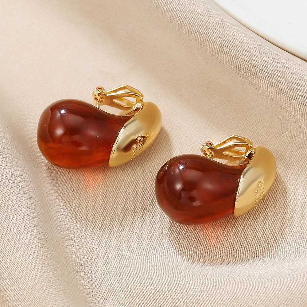 Newly arrived vintage resin tears clipped onto womens earrings metal splicing fashionable luxury earrings charming jewelry gifts banquet Y250401