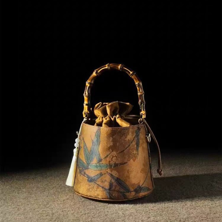 new free shipping designer bags Spring and summer new style bamboo bucket bag retro tassel handbag, single shoulder cross body women's bag