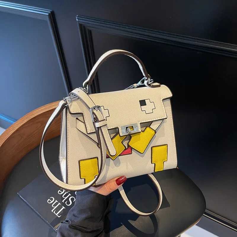 2025 new platinum bag high-end splicing portable womens bag shoulder small square bag versatile doll niche bagC250401