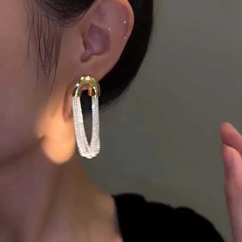 New fashion trend unique design elegant and exquisite light and luxurious long tassel earrings womens jewelry parties high-end gifts wholesale Y250401