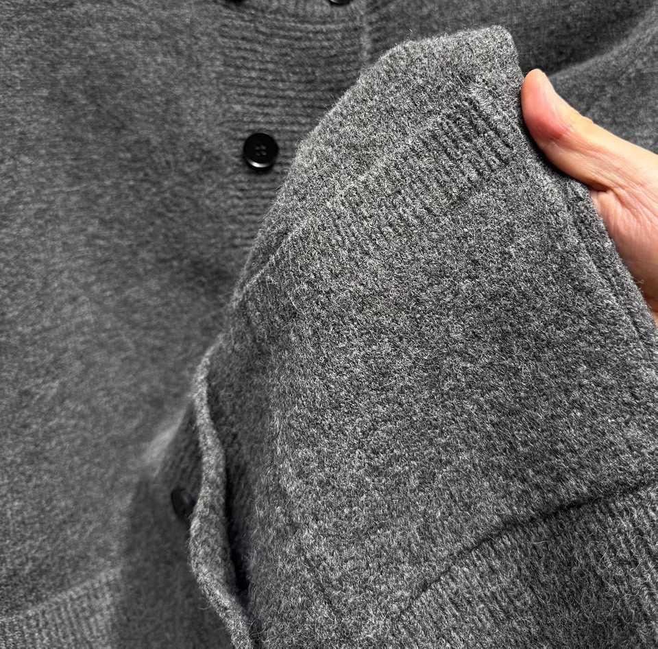 Personality fashion double breasted knitted cardigan mens high-quality spring autumn solid color pocket casual round neck coatT251103