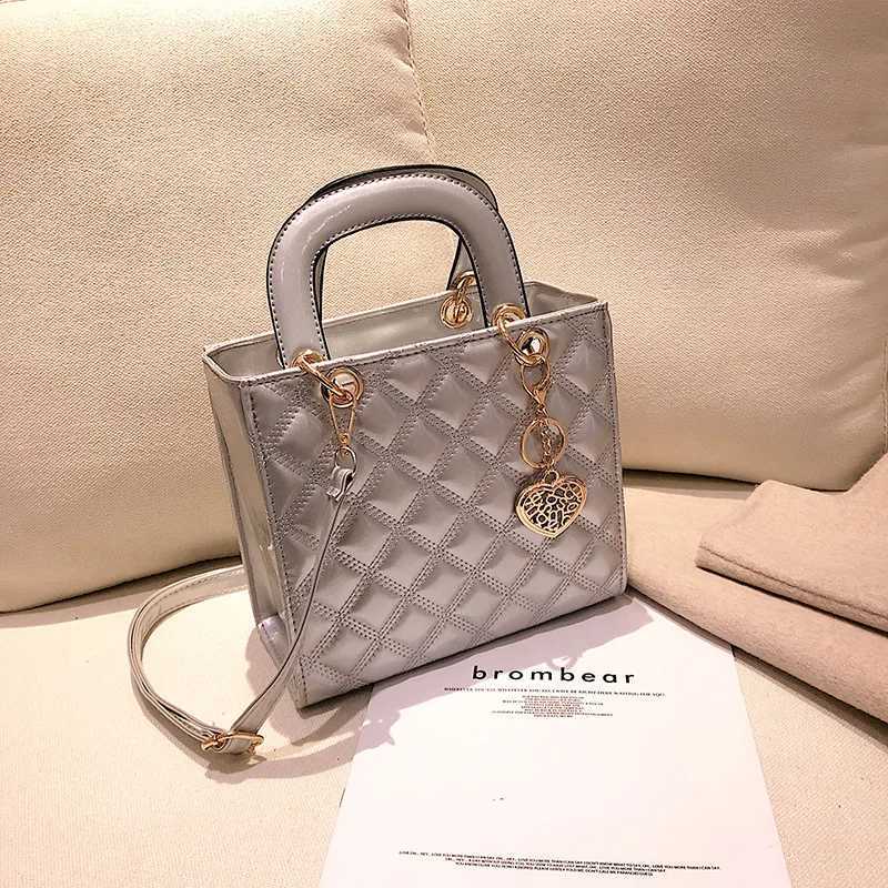 New Ladies Shiny Leather Crossbody Bag Girls Fashion Hundred Shoulder Bag Lattice Ladies Handbag Metal Heart Decoration PU MateC250403