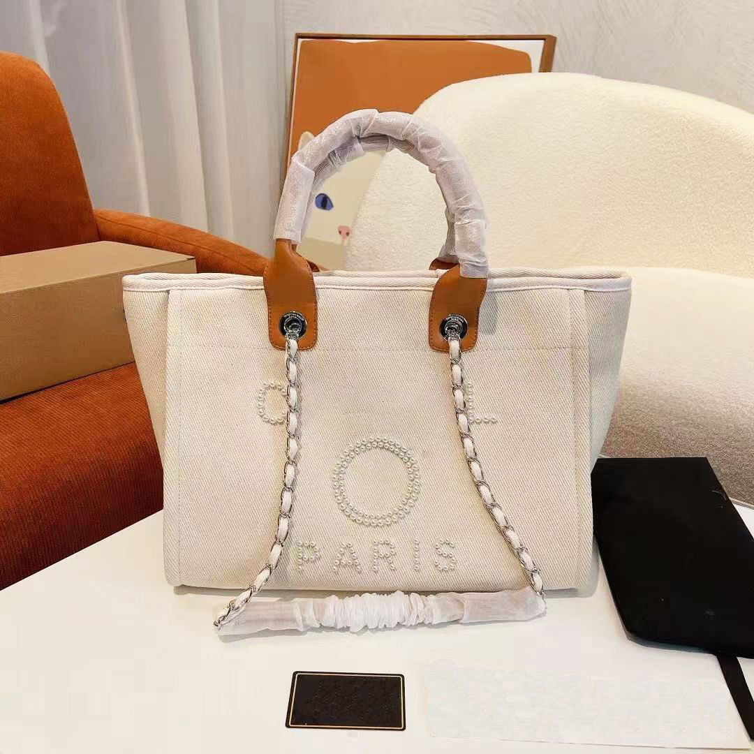 Designer bags Canvas beach bags Women's handbags Woven bags Tote shopping bags High quality handbags Tote bags Travel messenger bags Shoulder bags