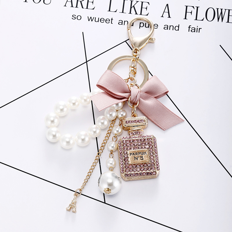 Korean-Style Designer Keychain Creative Handmade Diamond-Inlaid Perfume Bottle Alloy Key Ring with Bow & Pearl Bag Charm