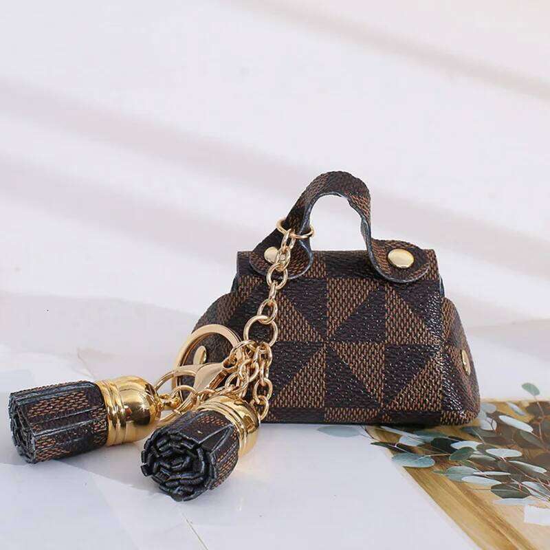 Designer Bag Christmas gift Creative Plaid Texture Leather Headphone For 4 Pro 2 3 2And1 Case Keychain Portable Mini Storage Bag Pendant Best Seller