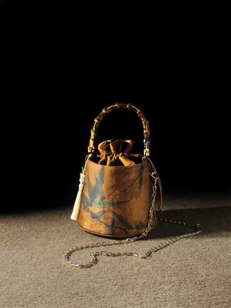 new free shipping designer bags Spring and summer new style bamboo bucket bag retro tassel handbag, single shoulder cross body women's bag