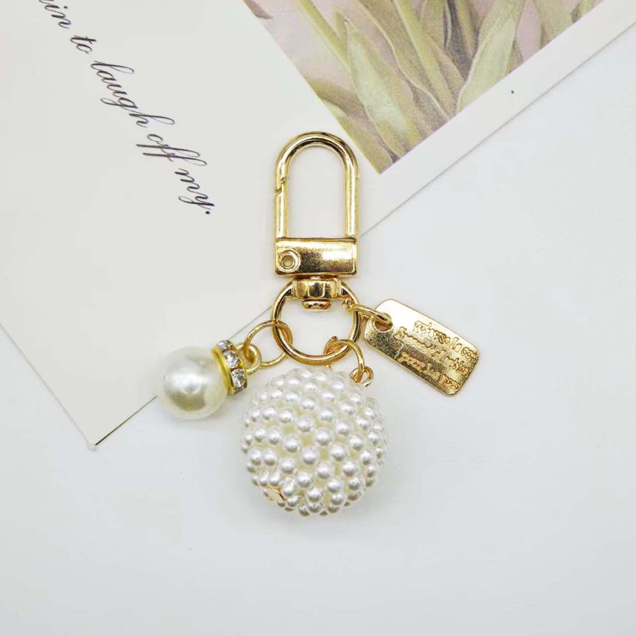 designer bag charm New Pearl Alloy Keychain Creative Hollow Heart Nameplate Accessories Earphone Case Bag Decoration Pendant keychain designer