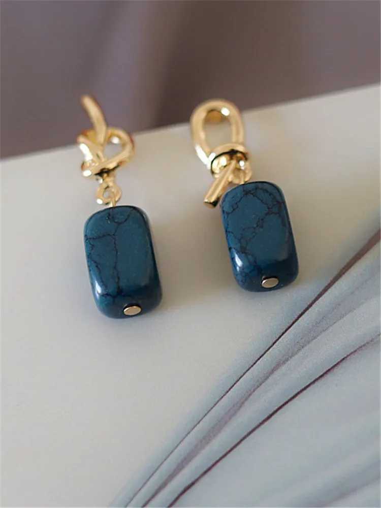 Kshmir2023 new asymmetric metal lake blue stone earrings suitable for womens simple temperature retro jewelry accessories Y250401
