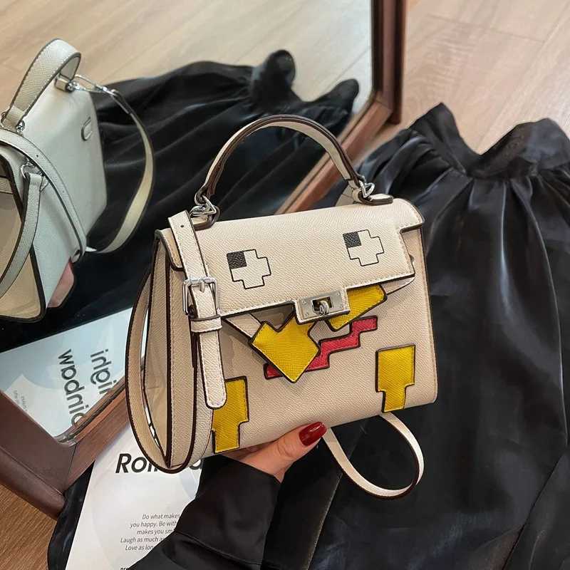 2025 new platinum bag high-end splicing portable womens bag shoulder small square bag versatile doll niche bagC250401