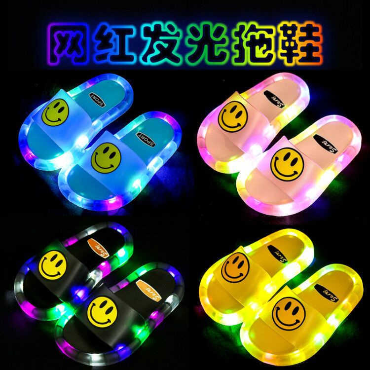 Internet celebrity new glowing childrens slippers cartoon smiling face flashing one line dragging girls anti slip luminous shoes J250403