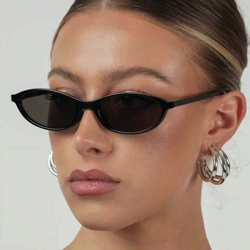 Fashionable oval frame women, cat eye street photography, personalized and trendy sunglasses, suitable for wearing sunglasses