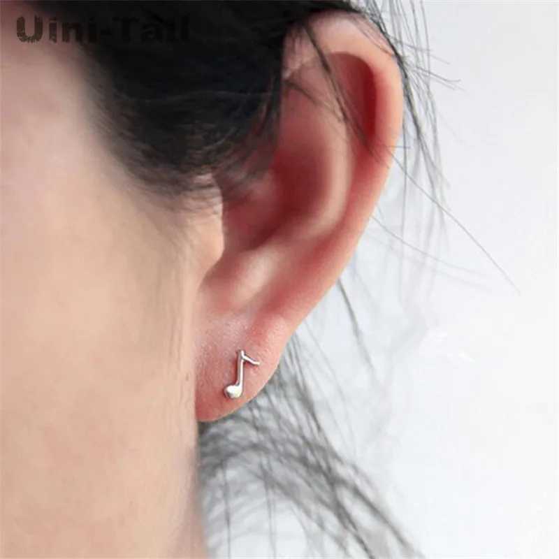 UiniTail Hot Music Elf 925 Tibetan silver cute note earrings Korean version of allergyfree pure silver ear jewelry ED116 C251103
