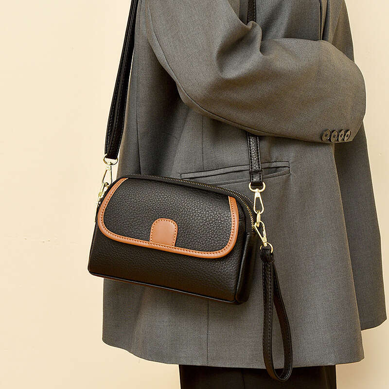 Mom's Genuine Leather 2024 New Fashionable Multi layer Small Versatile Women's Single Shoulder Crossarm Carrying Phone Bag