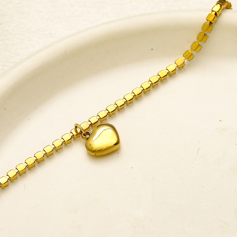 Sparkling Gold Tone Bracelet with Pave Set Crystals and Heart Charm Chic Jewelry for Women Gift for Special Occasions