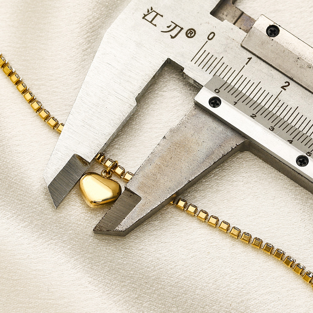 Sparkling Gold Tone Bracelet with Pave Set Crystals and Heart Charm Chic Jewelry for Women Gift for Special Occasions