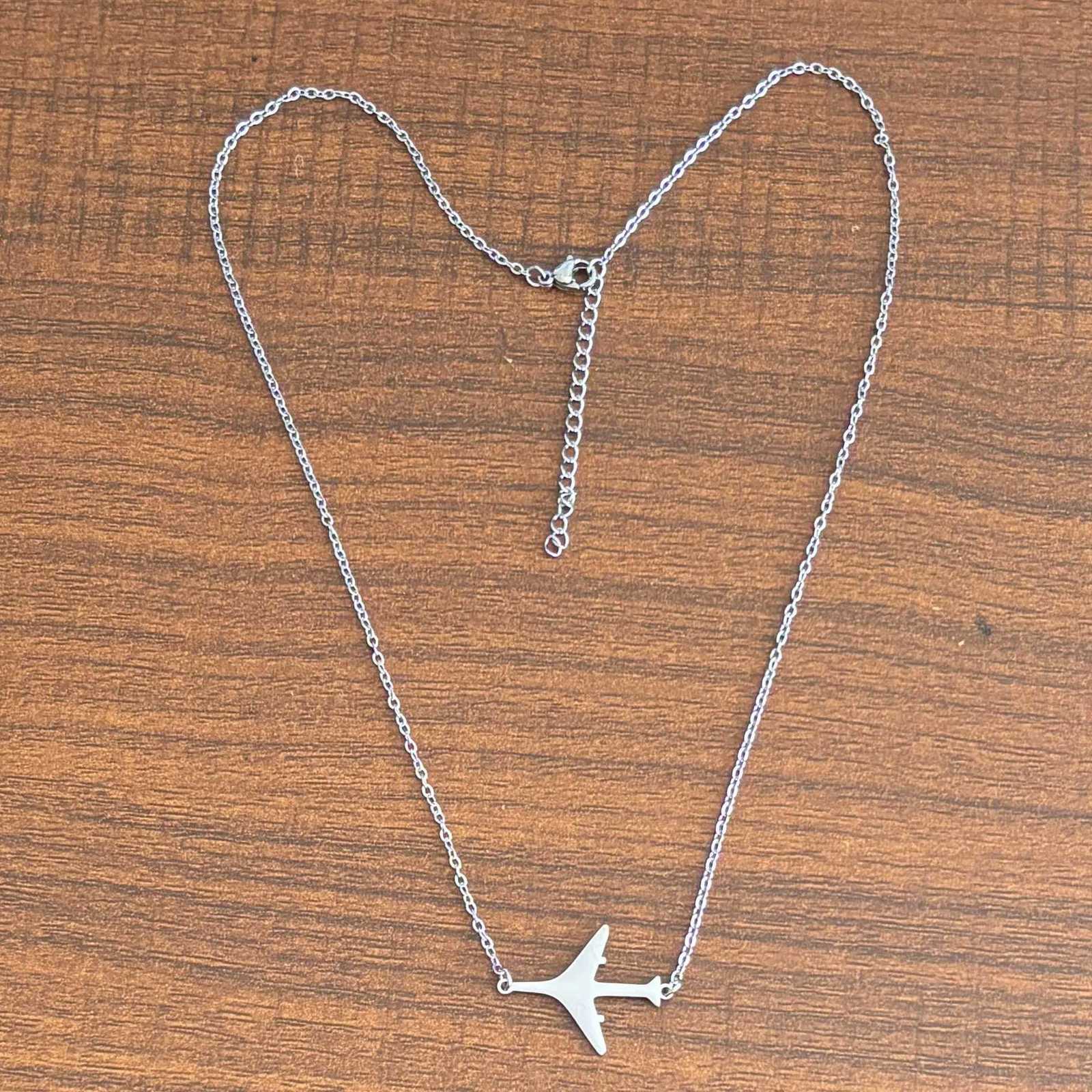 Elegant Stainless Steel Airplane Pendant Necklace - Fade-Resistant Sleek Hollow Design For MenXJ251104
