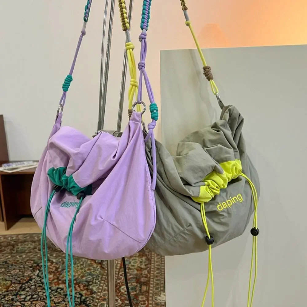 Casual lightweight shoulder bag letter contrast color cross body bag large capacity nylon drawstring bag for 250402
