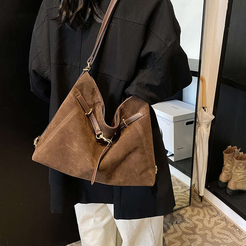 Simple large capacity belt decoration women's backpack tote bag wholesale 2025 new casual versatile fashion clothing