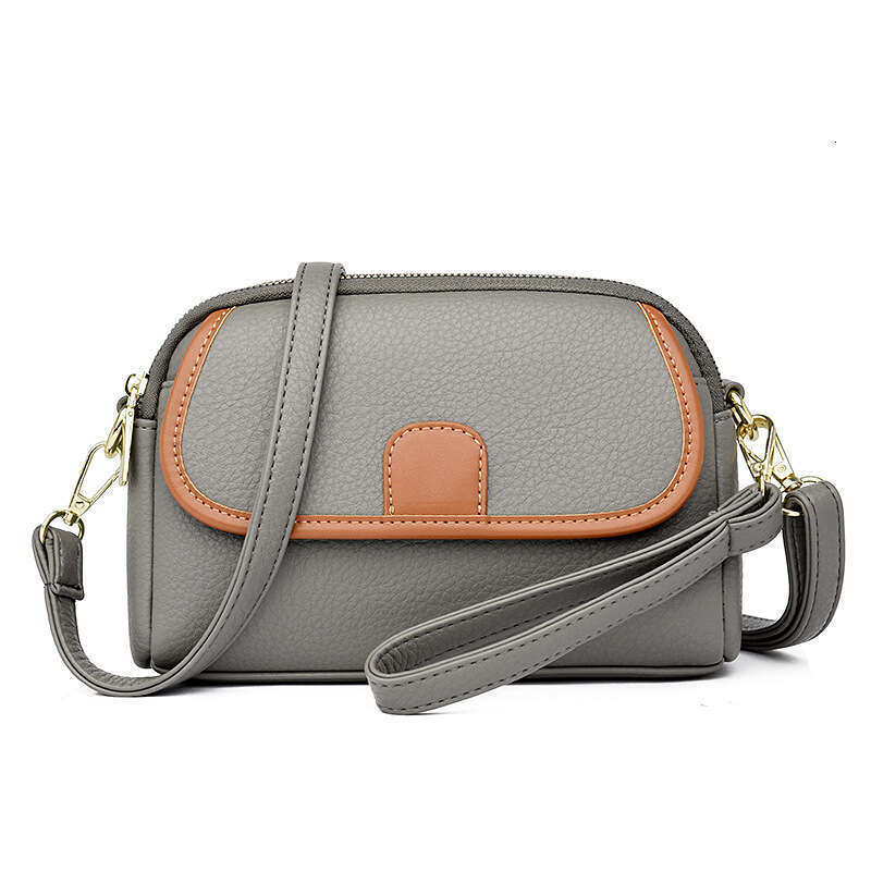 Mom's Genuine Leather 2024 New Fashionable Multi layer Small Versatile Women's Single Shoulder Crossarm Carrying Phone Bag