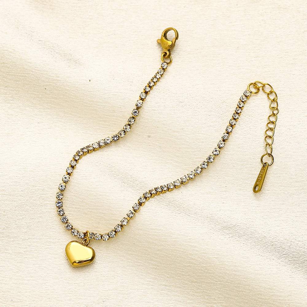 Sparkling Gold Tone Bracelet with Pave Set Crystals and Heart Charm Chic Jewelry for Women Gift for Special Occasions