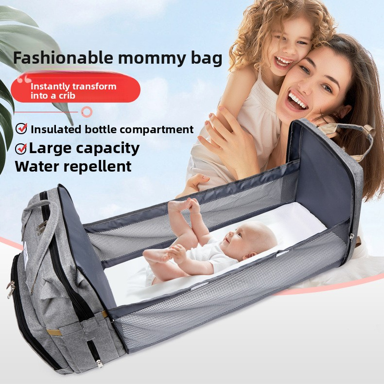 New popular and fashionable foldable baby crib mother and baby bag with large capacity, handheld bottle, diaper, backpack design, designer mommy bag