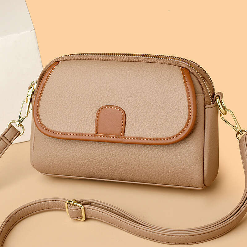 Mom's Genuine Leather 2024 New Fashionable Multi layer Small Versatile Women's Single Shoulder Crossarm Carrying Phone Bag