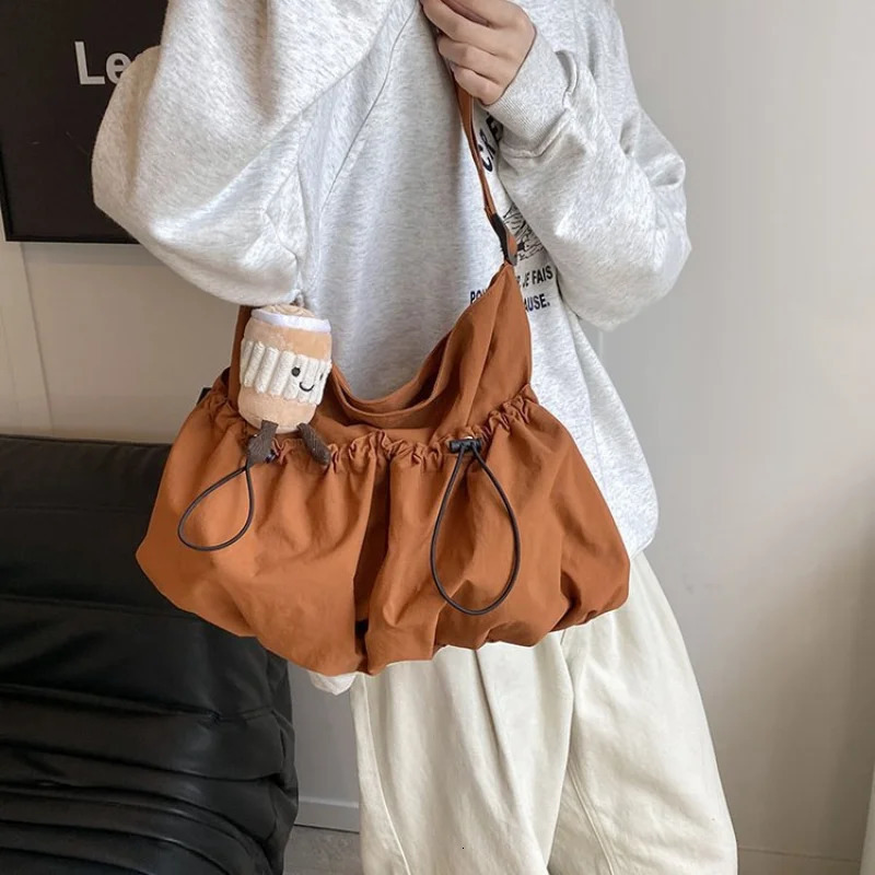 Ultra light folding cross body bag Japanese style nylon folding bag fashionable and casual commuting single shoulder garbage bag 250402