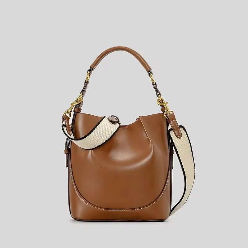 2025 New Fashion Splicing Canvas Bucket Bag Designer Women's Handbag Pu Leather Shoulder Width Strap Handbag2