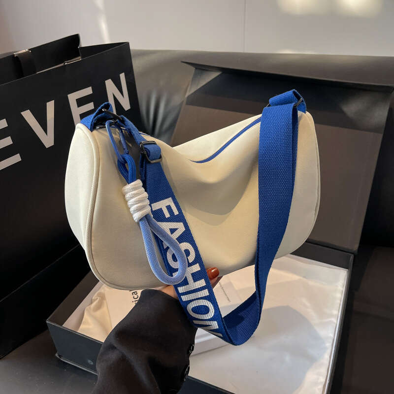 Waterproof Oxford cloth large capacity dumpling with crossbody for female niche new versatile casual sports style shoulder bag trend