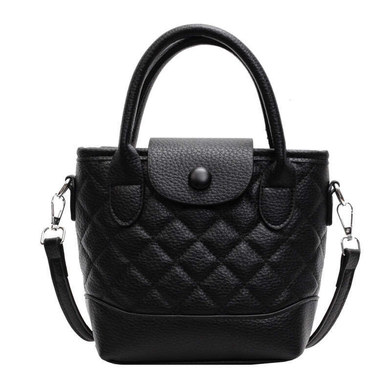 Korean version of niche hand-held bucket for women's spring new fashion versatile and high-end single shoulder crossbody bag