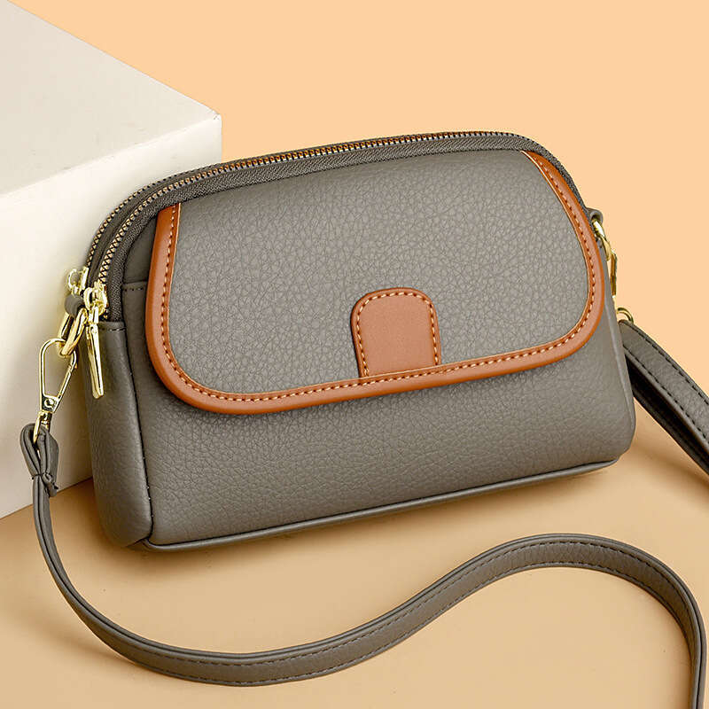 Mom's Genuine Leather 2024 New Fashionable Multi layer Small Versatile Women's Single Shoulder Crossarm Carrying Phone Bag