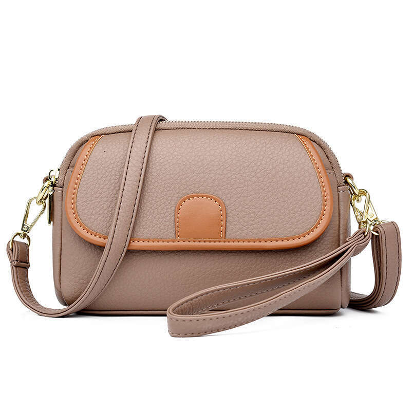 Mom's Genuine Leather 2024 New Fashionable Multi layer Small Versatile Women's Single Shoulder Crossarm Carrying Phone Bag