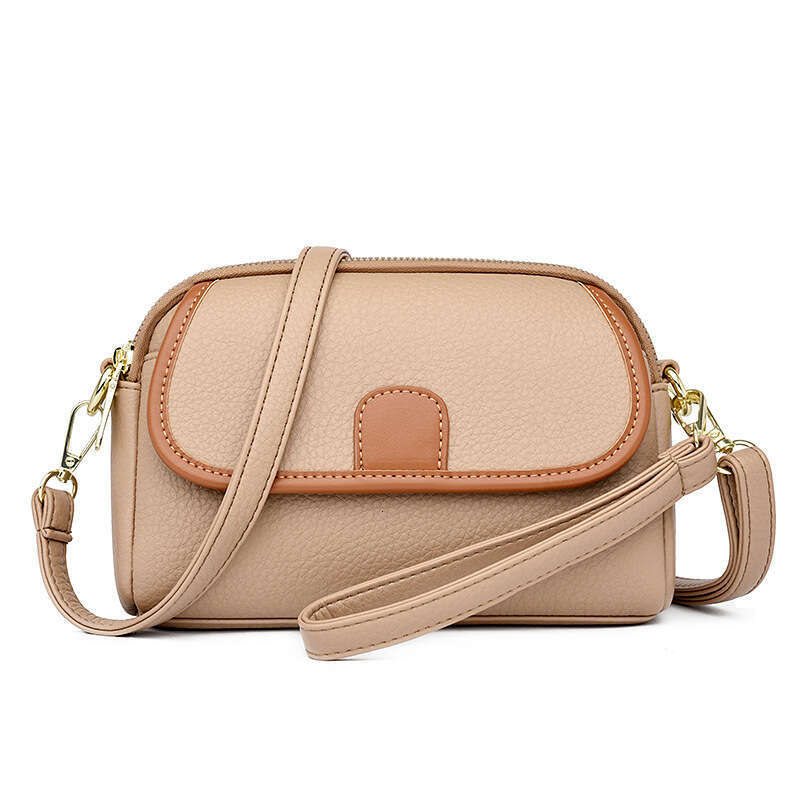 Mom's Genuine Leather 2024 New Fashionable Multi layer Small Versatile Women's Single Shoulder Crossarm Carrying Phone Bag