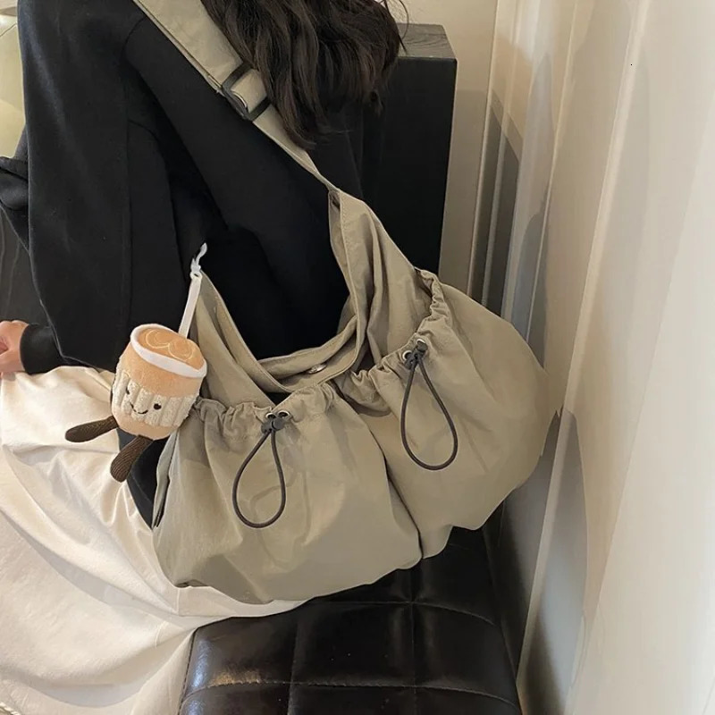 Ultra light folding cross body bag Japanese style nylon folding bag fashionable and casual commuting single shoulder garbage bag 250402