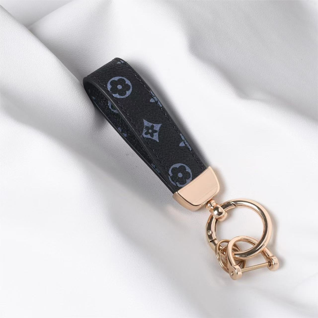 Unisex designer new floral leather wrist keychain, car key chain with 2 key rings and anti-lost D-ring, women's keyring wristband