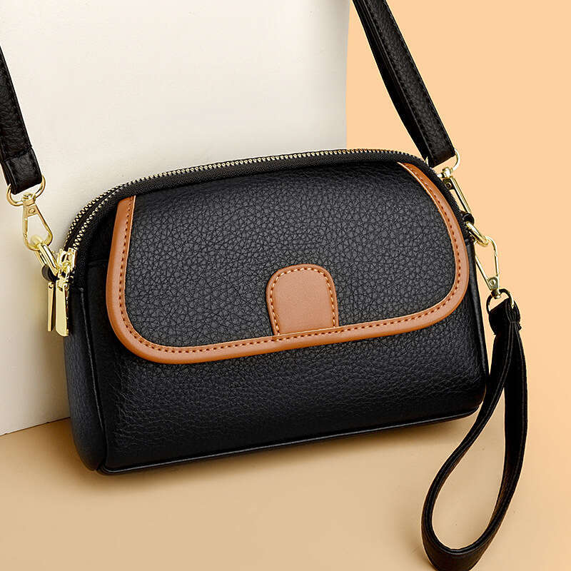 Mom's Genuine Leather 2024 New Fashionable Multi layer Small Versatile Women's Single Shoulder Crossarm Carrying Phone Bag