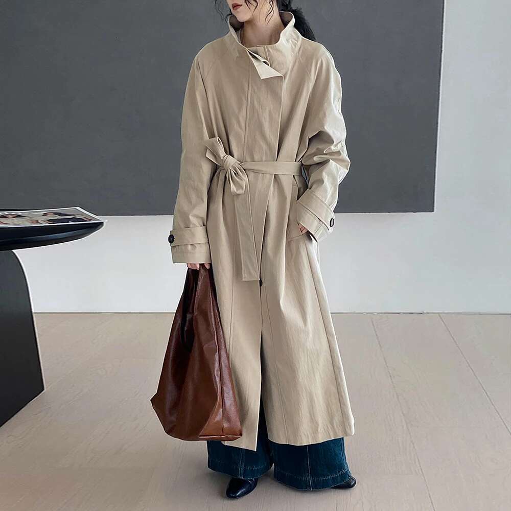 TWOTWINSTYLE Solid Casual Patchwork Lace Up Trench For Women Stand Collar Long Sleeve Spliced Button Loose Overcoat Female New