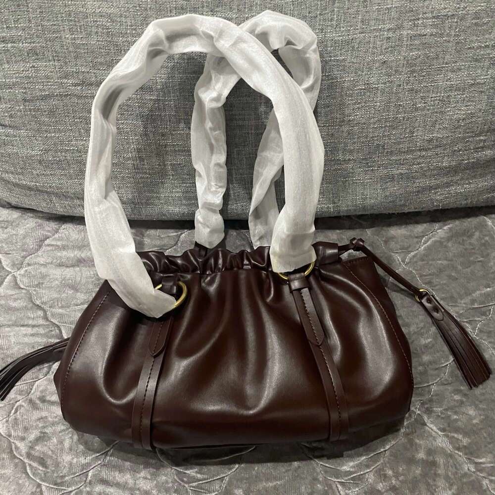 Women's Bags Women's Bags High new retro jiaozi bags soft real leather pleated tassel baguette hand bill of lading shoulder Women's bag