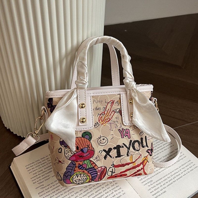 Free shipping small bag women's new painted graffiti fashion hand basket bag artistic texture crossbody bag 2025